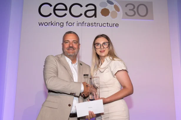 Gabriela receives the award from CECA Southern Chair, Kevin Valentine.